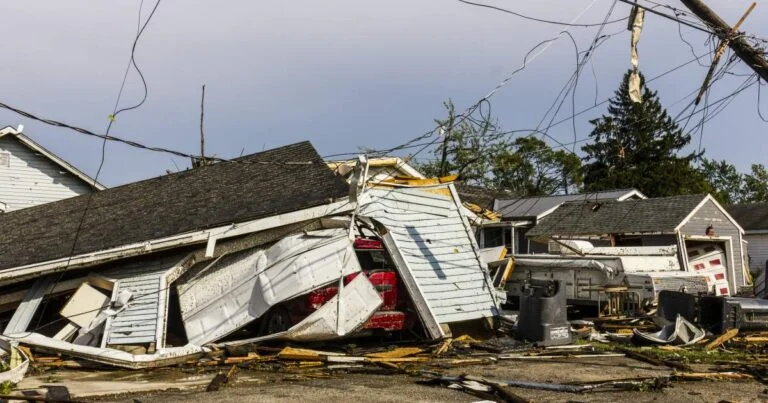 Structural Engieer Inpects Damage